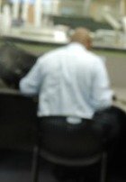 man sitting at desk-earn a living online